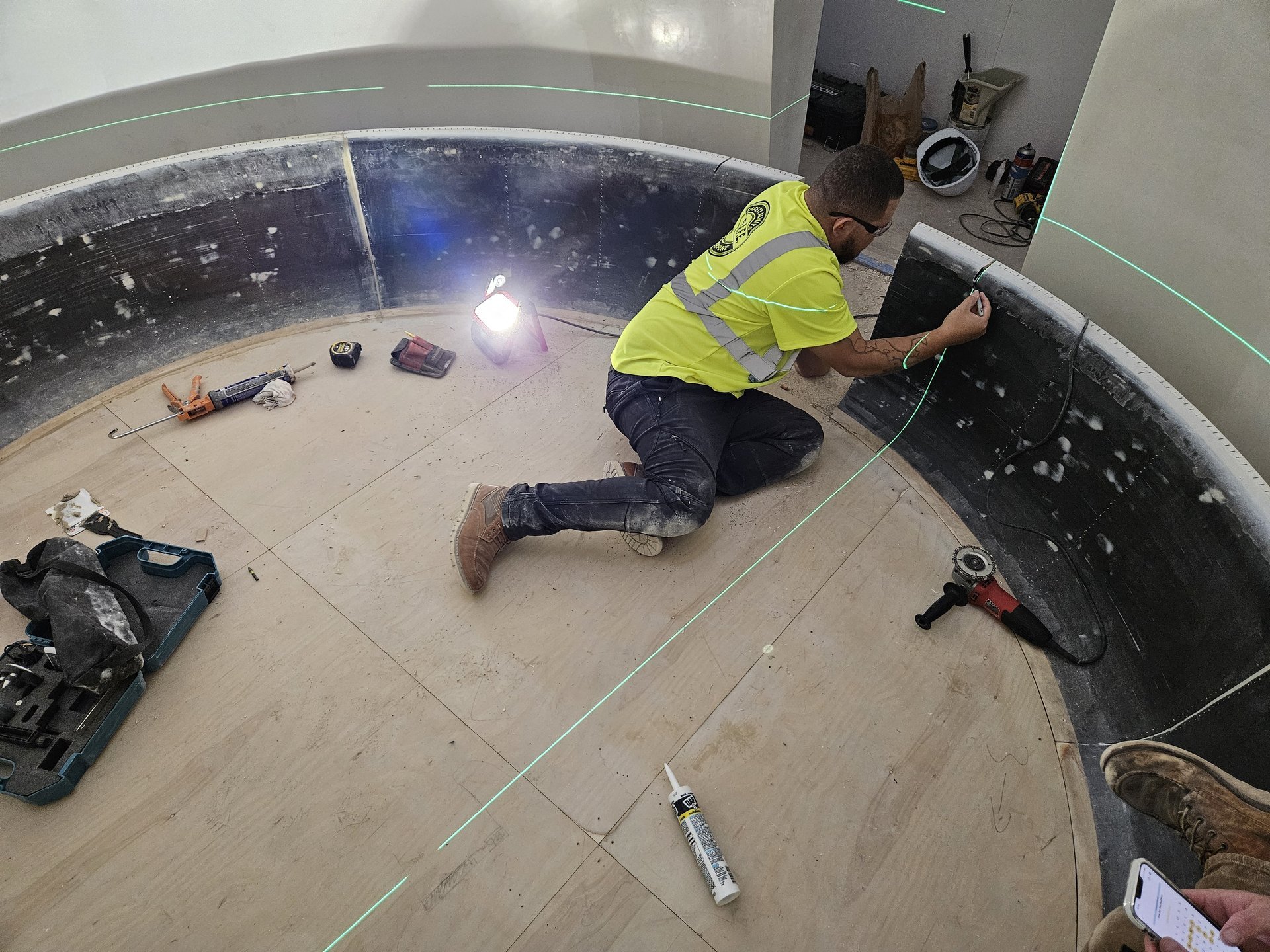 Meditation bench installation — bench sections being fitted on site